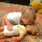 funny baby kiss doll.jpg